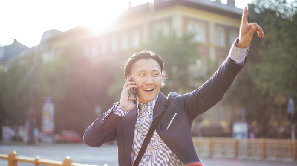Businessman diverting 1300 number to his mobile hailing a cab